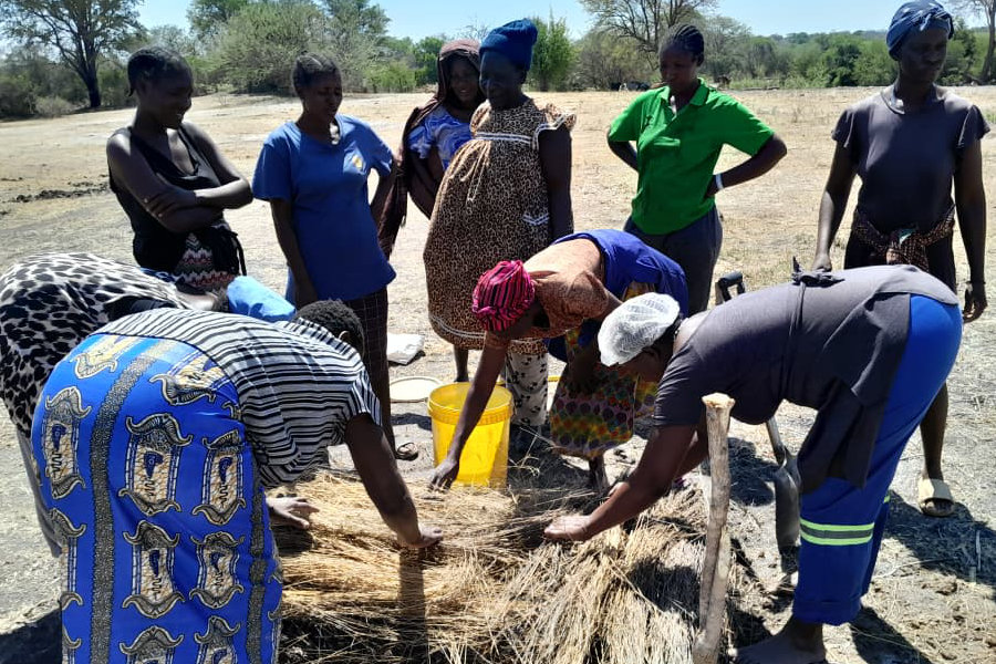 Farmers making compost to enrich the soil