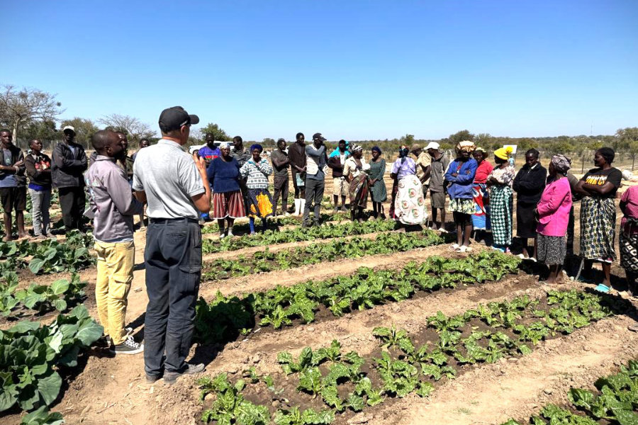The Farming Instructor leads demostration and discussion on smarter ways to farm